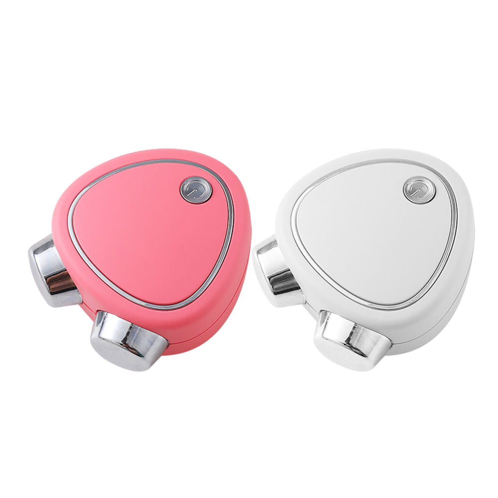 Mini masajeador facial en rosa y blanco